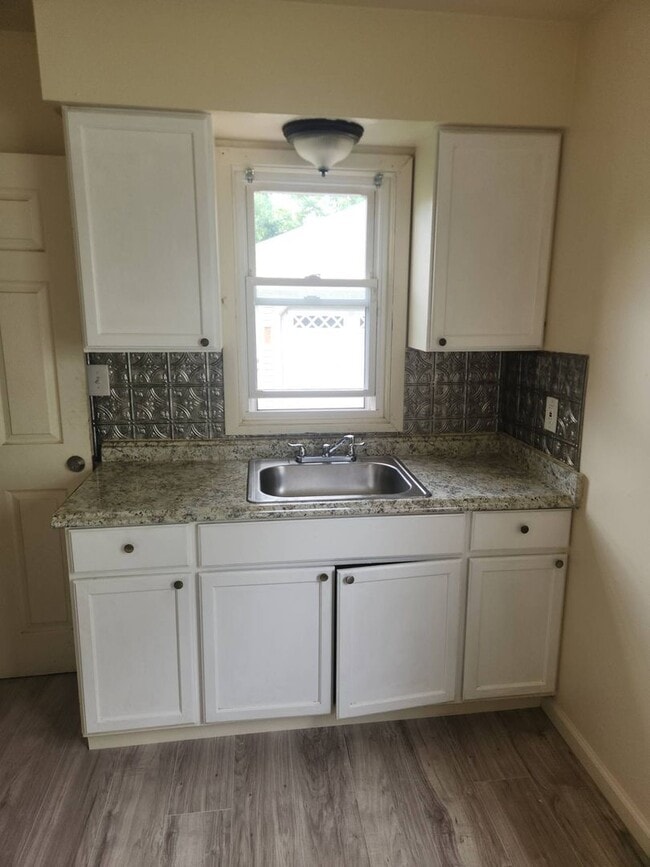 Building Photo - Move-In Special: Save $300 on This Charmin...