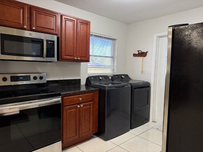 Building Photo - "Charming 3-Bedroom Home with Gleaming Hardwood Floors!"