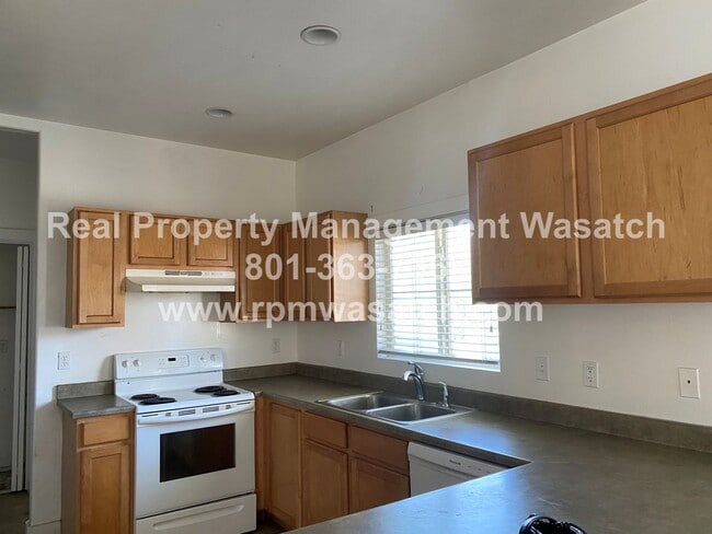 Building Photo - Great 4 bedroom 2 bath West Valley Home