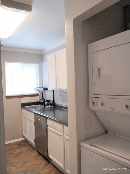 Stacked washer and dryer in unit - 945 Tampico Court