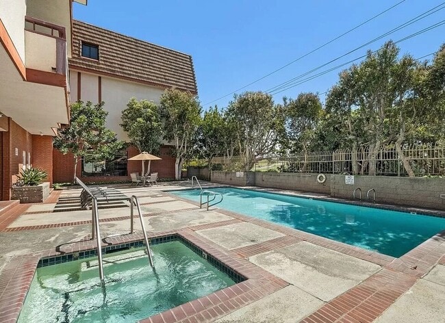 Building Photo - 8828 Pershing Dr