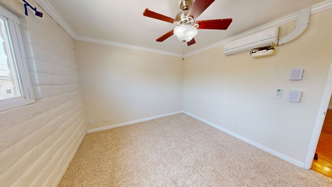 Building Photo - Freshly Painted Upstairs Condo with Community Pool