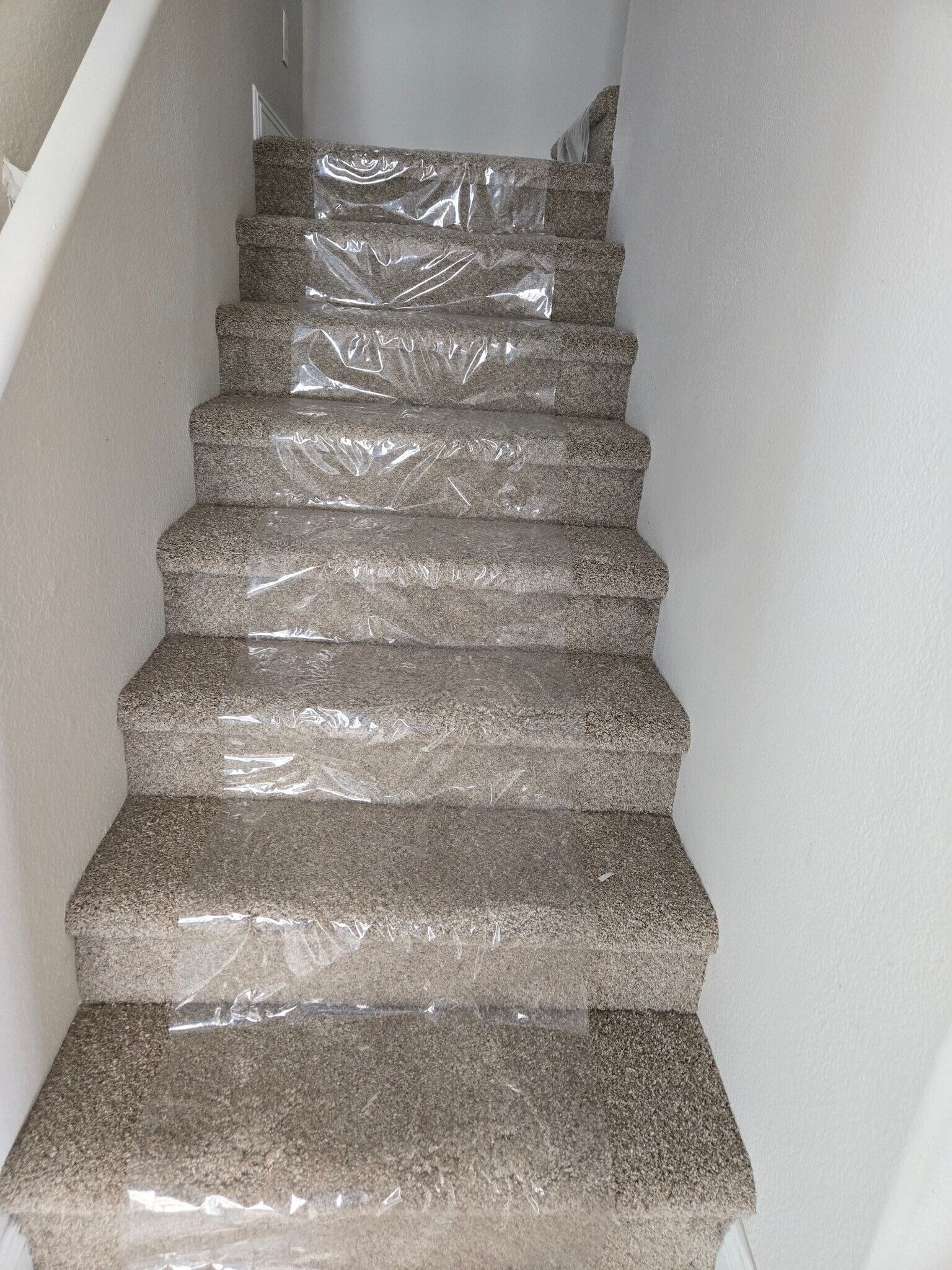 Stair case going up to the bedrooms - 8799 Horizon Wind Ave