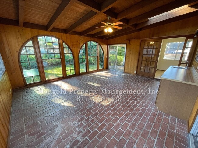 Building Photo - Beautiful 4-bed 2-bath Home with Cozy Fireplace, Front and Back Yards and Large Windows!