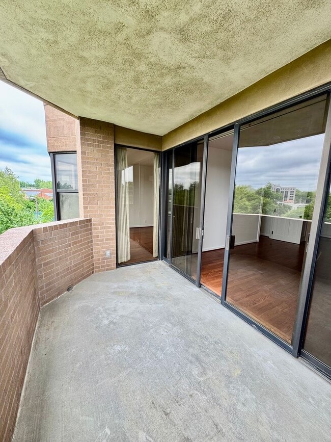 Building Photo - Experience Luxury and Prestige at Yorktown Condominiums
