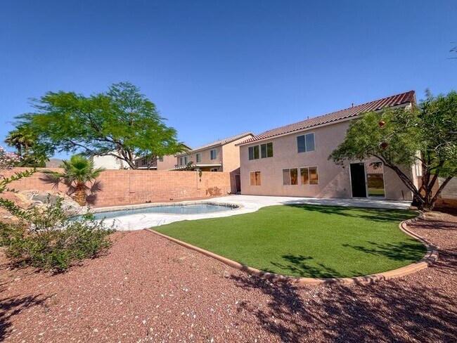 Building Photo - Stunning 5-Bedroom Home in Gated Community...