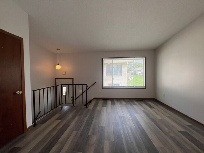 Building Photo - Spacious 2-Bed, 1-Bath Townhome with a Gar...