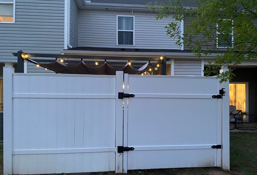 Back view – 6 foot privacy vinyl fence with pergola - 238 Yorktown Ln