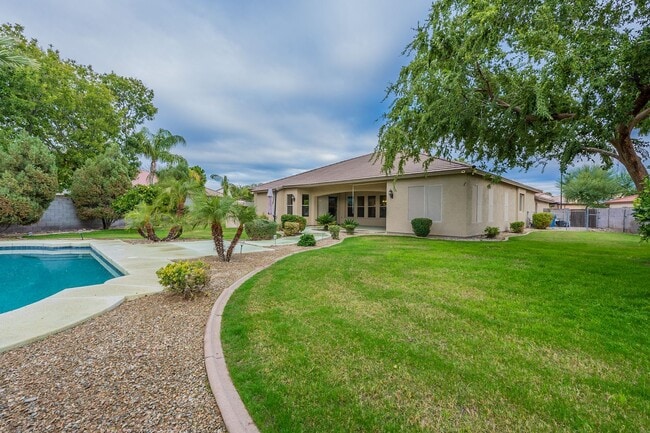 Building Photo - 4 Bedroom, 2.5 Baths with Private Pool!