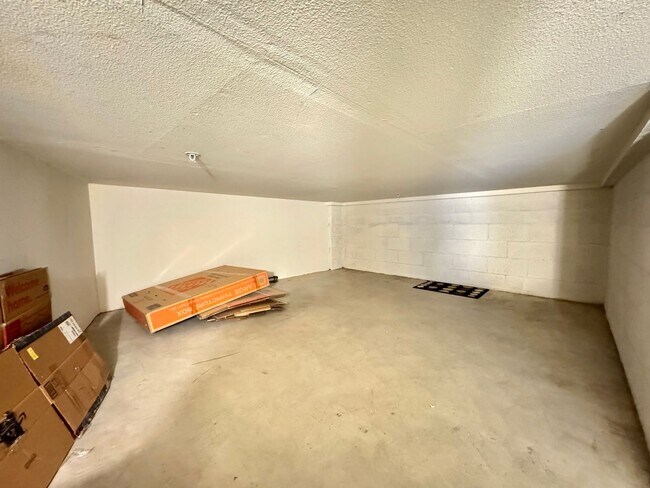 Building Photo - Beautifully Remodel Townhouse with AC & Two Car Garage!