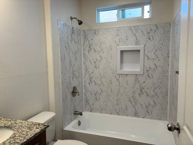 Building Photo - Terrific detached 2/2 Unit with full Priva...