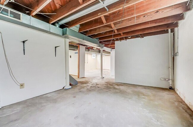 1st Room Unfinished Basememt - 6604 Buckingham Plz