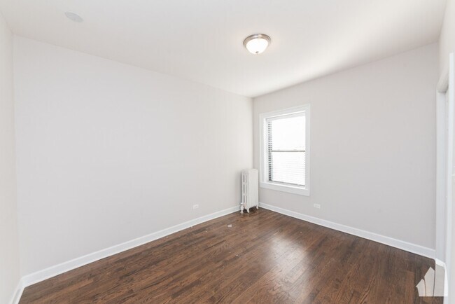Building Photo - 1357 W Touhy Ave