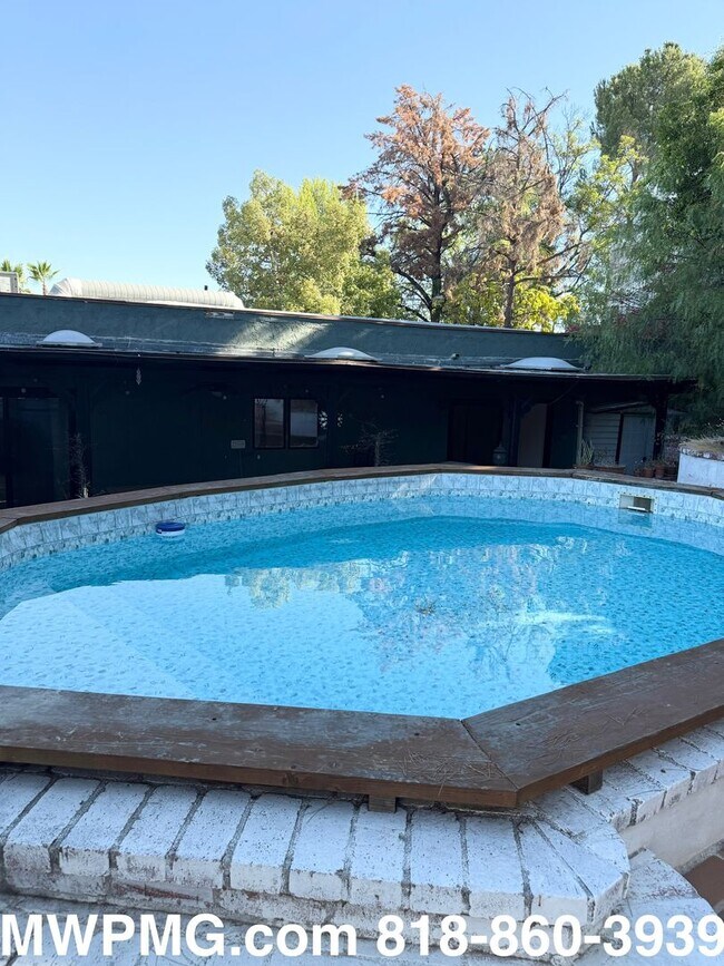 Building Photo - 4Bed 3Bath Woodland Hills home is an absol...