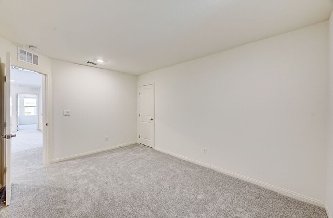 Building Photo - Beautiful two-story rental home featuring 4 bedrooms, 3 bathrooms, and a 2-car garage.