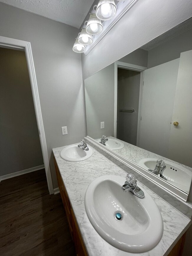 Building Photo - For Rent - Four-Bedroom Two-Bathroom Home ...