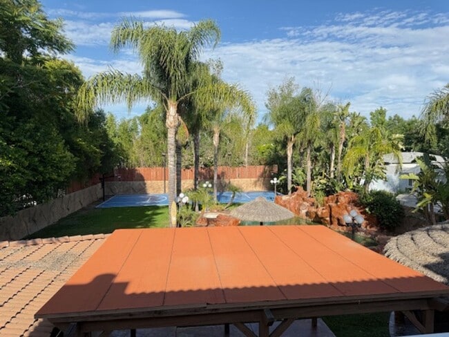 Building Photo - Gated estate with a backyard oasis