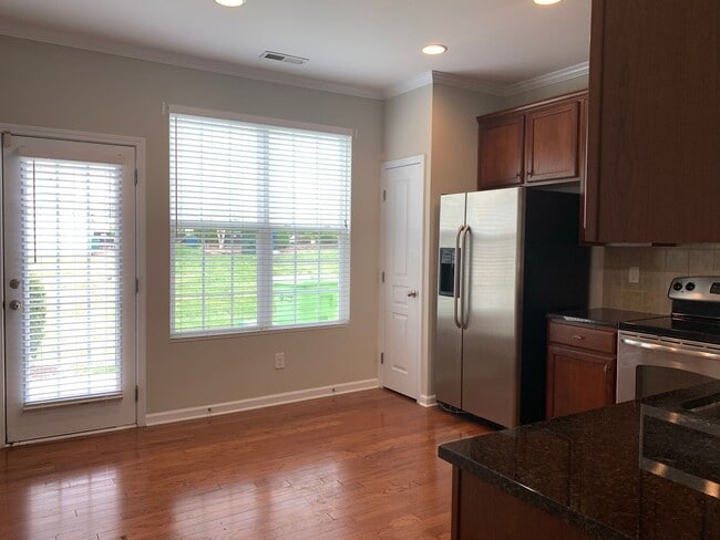 Building Photo - Perfectly Located 2 Bedroom Suite Townhome...