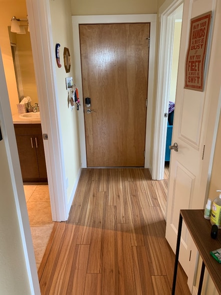 Entryway, with guest bathroom, office, and coat closest - 626 4th Ave W