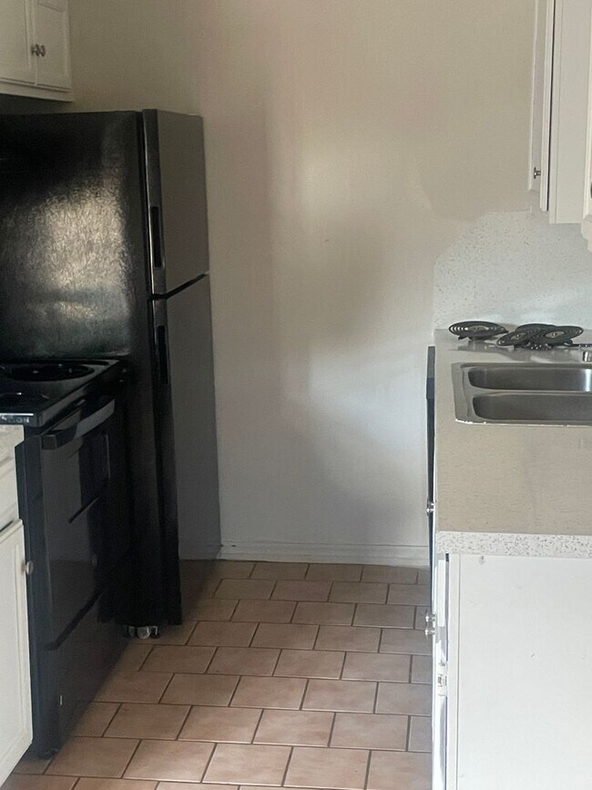 Building Photo - 5116 S Delaware Pl