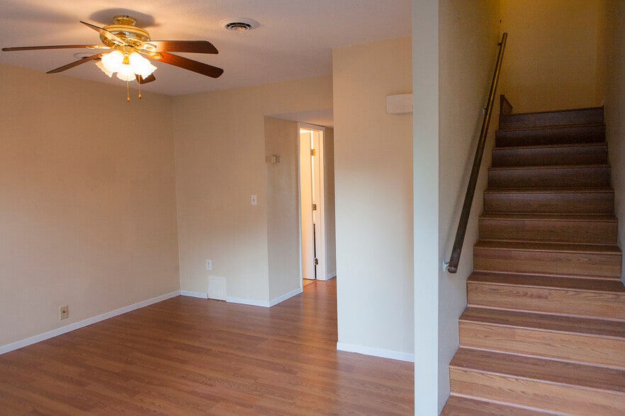 Living room and staircase to second level - 1805 King College Rd