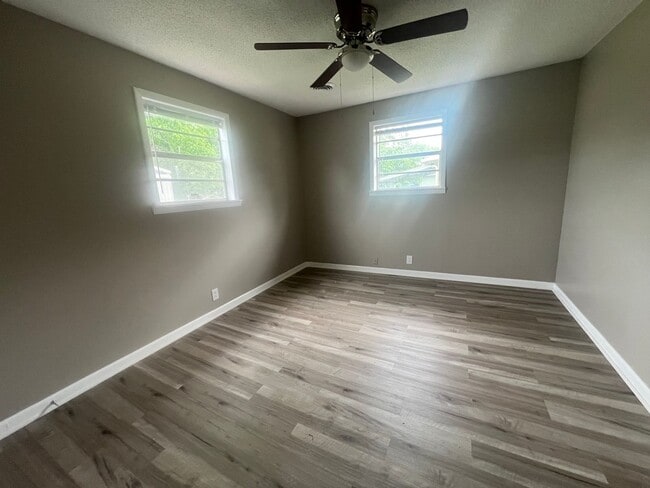 Building Photo - Three bedroom home with XL garage!