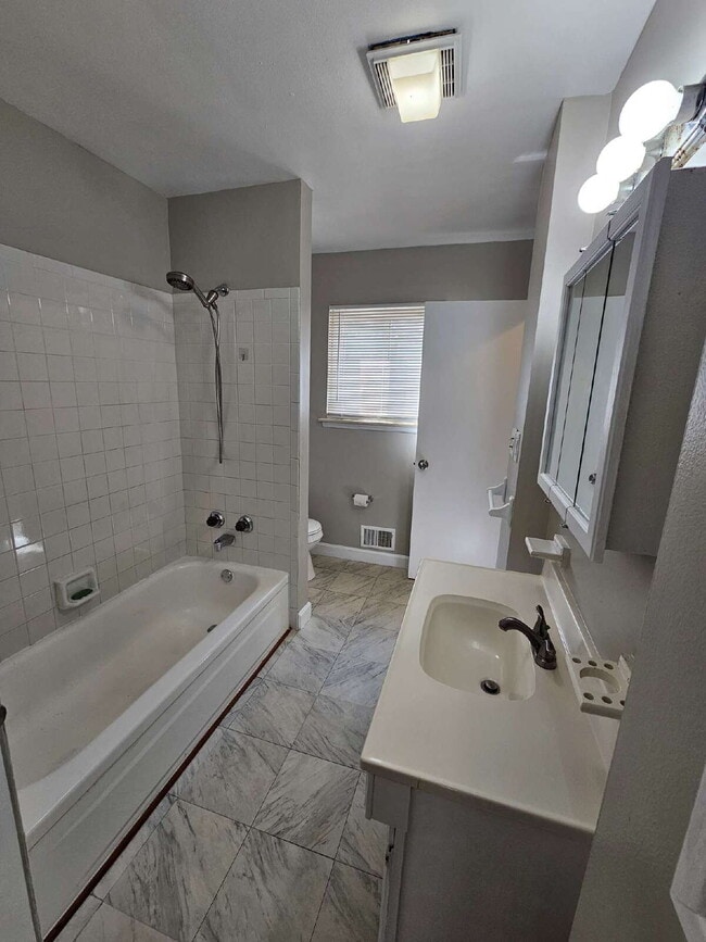 Building Photo - 3-Bedroom Brick Ranch, Hardwood Floors, Large Kitchen, Big Basement & 2-Car Garage