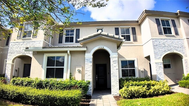 Building Photo - 1668 SE 26th Ter