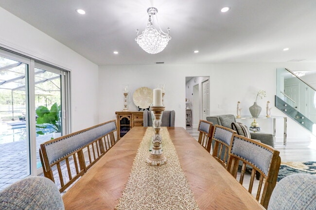 Building Photo - Fully Furnished 4-Bedroom Pool Home with Golf Course Views in Northdale