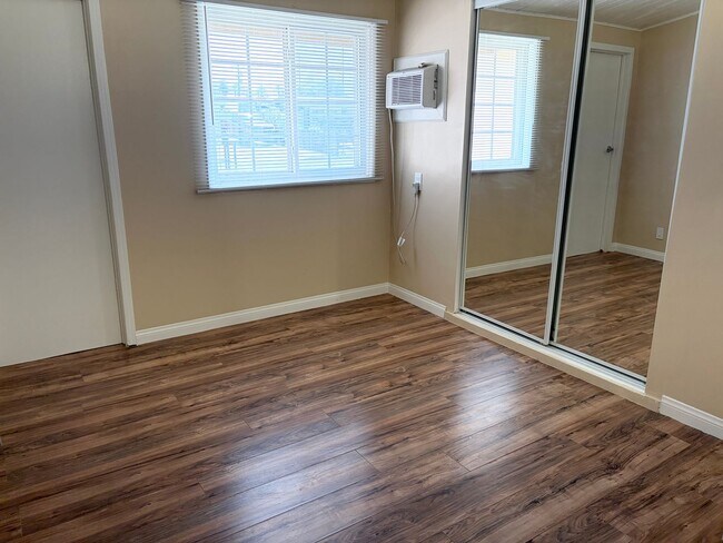 Building Photo - Gated Main House with Private Backyard & Bonus Room