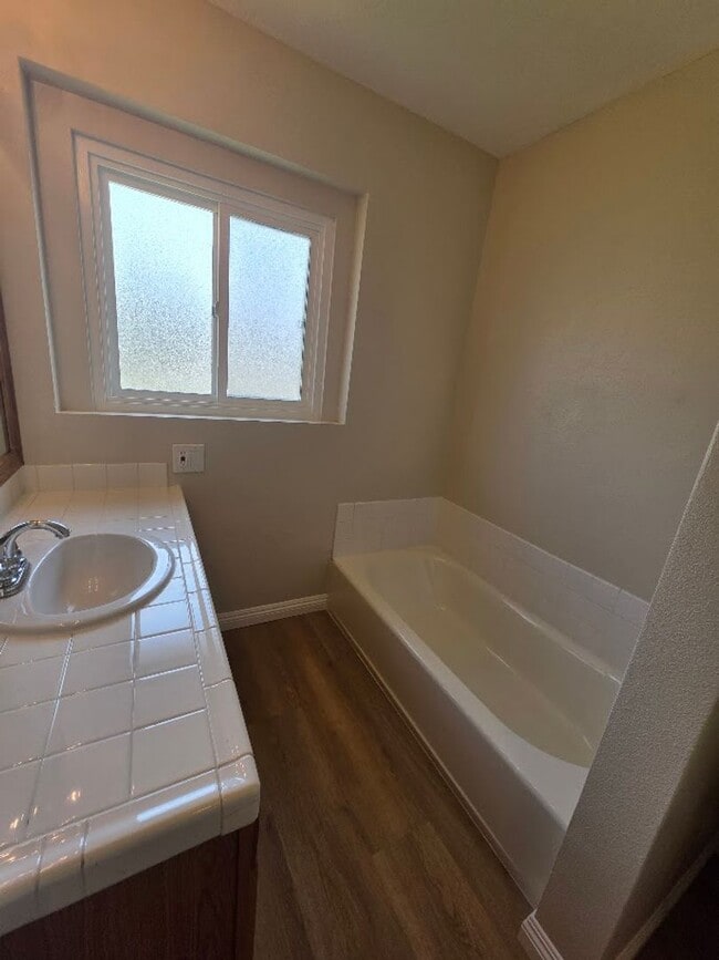Building Photo - TURNKEY-RENT READY SPACIOUS 2BD/2BA HOME, 2-CAR GARAGE WITH AN AUTOMATIC ROLL-UP DOOR, LARGE COVE...