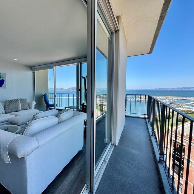 Building Photo - Just Unpack, Pour a Beverage, & Cue the Su...