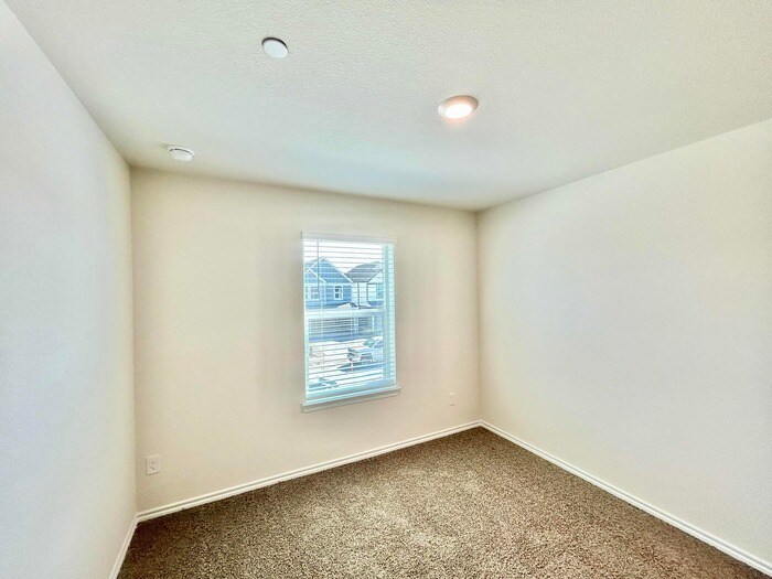 Building Photo - 7012 Cottonseed Dr