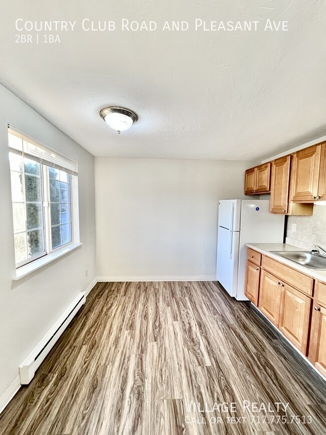 Building Photo - New Cabinets & Flooring! Large 2-bed w/ ea...