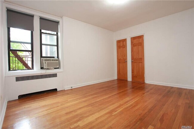 Building Photo - 65-10 99th St
