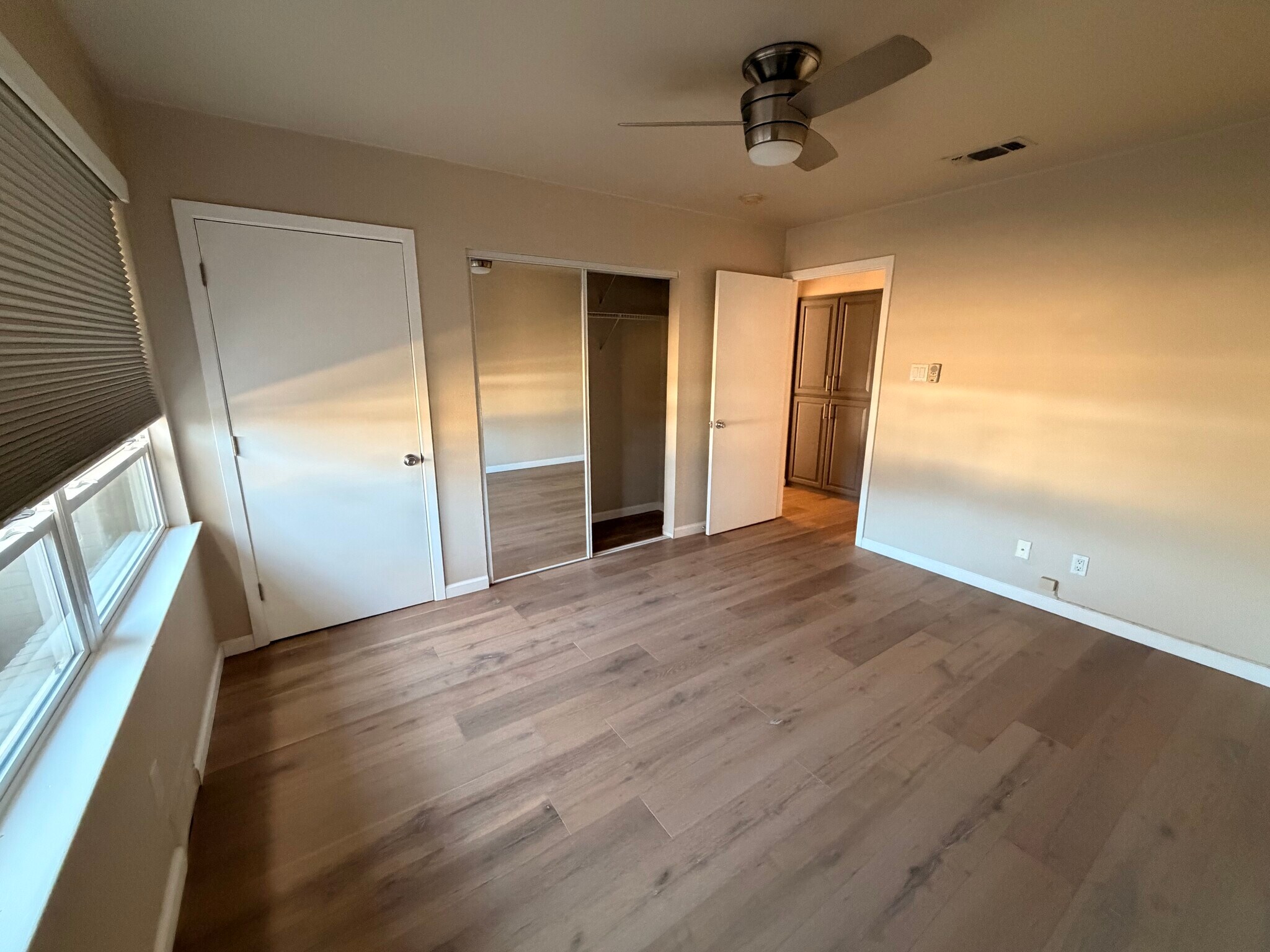 3rd bedroom with ample storage and custom blackout shades - 3414 Winged Foot Ct