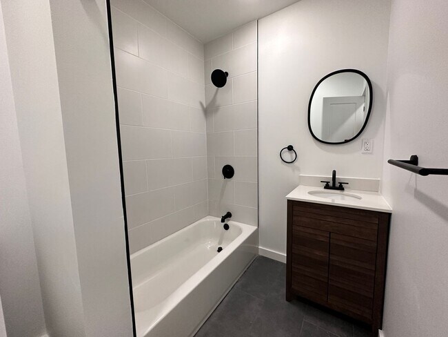 Building Photo - Renovated 2BR/2BA w/ Private Yard, Porch & In-Unit Laundry