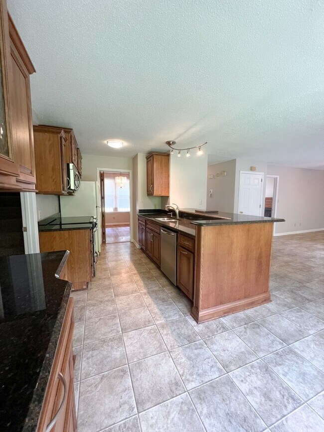 Building Photo - Gorgeous Single-Family Home! Large Deck, B...