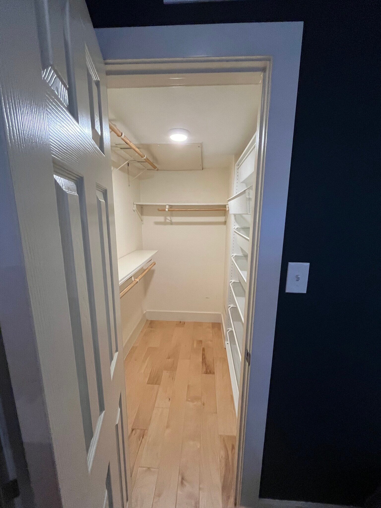 The master bedroom features a spacious walk-in closet. - 909 Reinli St