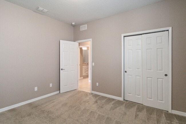 Building Photo - Gorgeous Energy Efficient 4/2 Home in Gated Community Close to Lake Nona