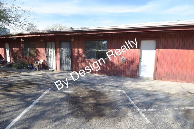 Building Photo - Charming Mid-Century Style: Vaulted Beams & Private Oversized Yard