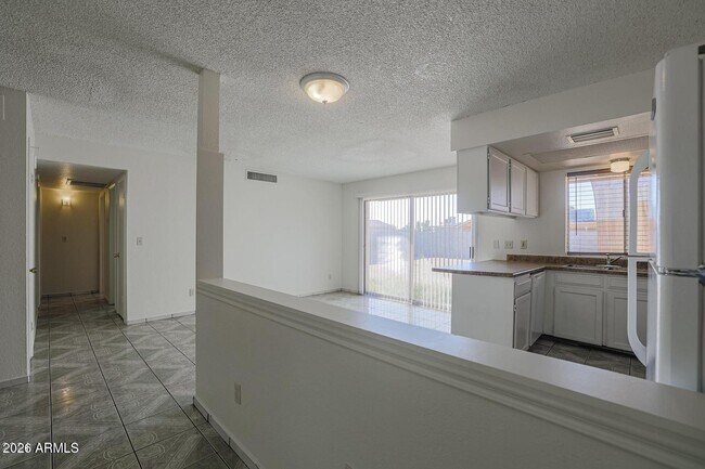 Building Photo - 3020 N 87th Ave