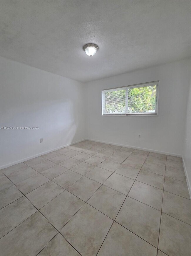 Building Photo - 10725 NW 8th Ave