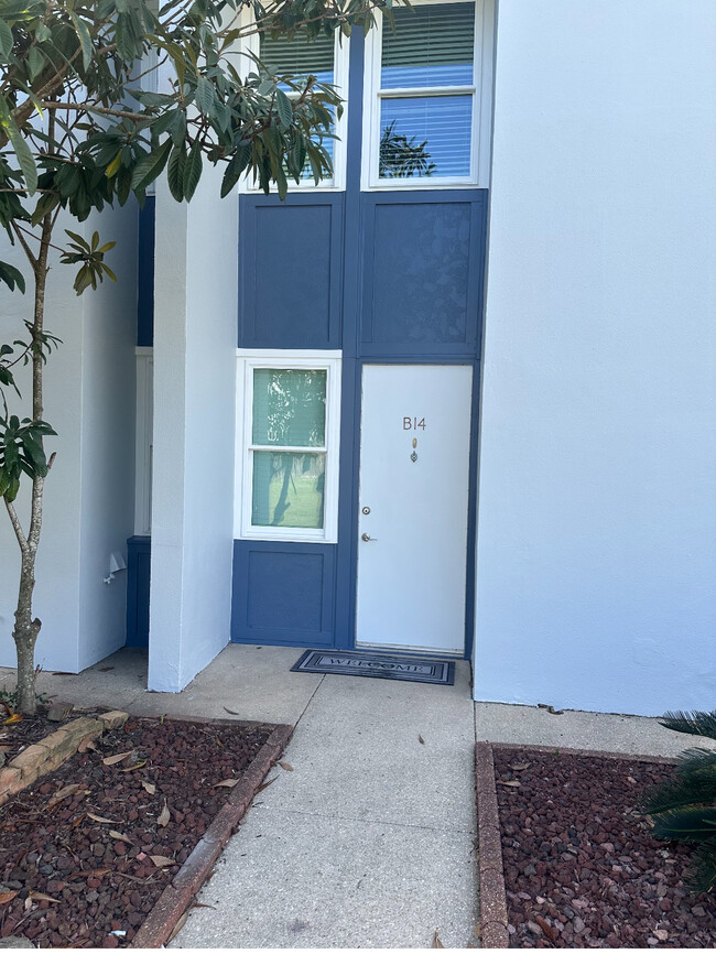 Newly painted exterior and new energy efficient windows - 201 Pensacola Beach Rd