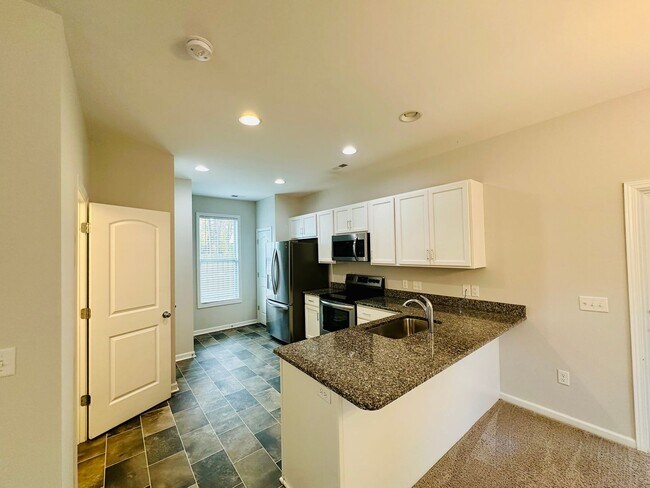 Building Photo - Leland - Newer construction house with two-car garage!