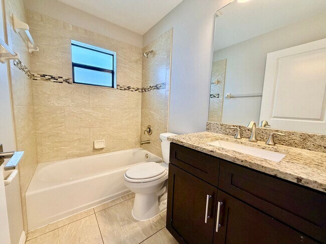 Building Photo - Move-In Ready 3BR Home in SW Cape Coral with Fenced Yar+Screened Lanai+Lawn Care Included+Pet Fri...
