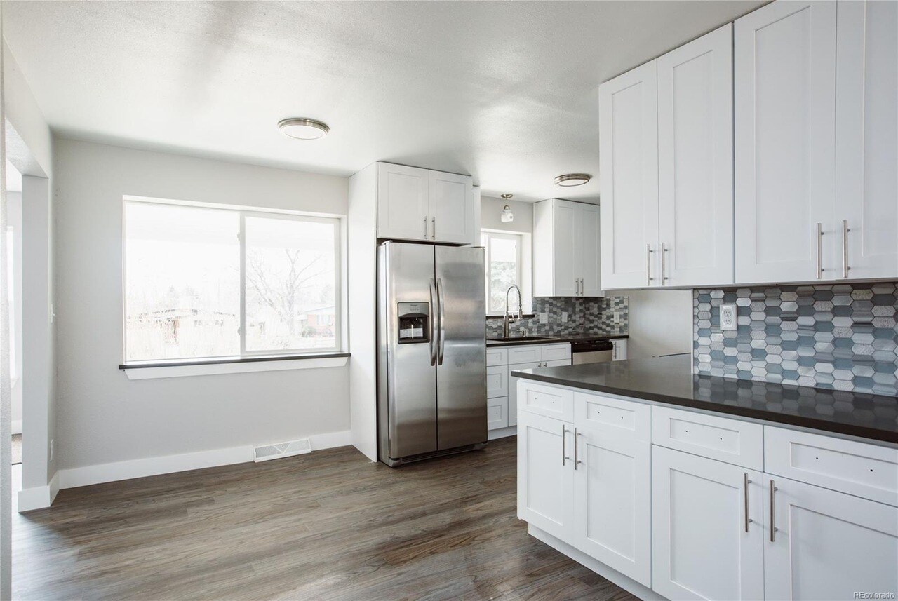 Upstairs Unit Kitchen - 165 W Midway Blvd