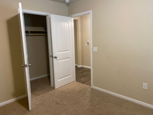 Building Photo - Three Bedroom, Two Bath, Two Car Garage, Washer and Dryer are included.