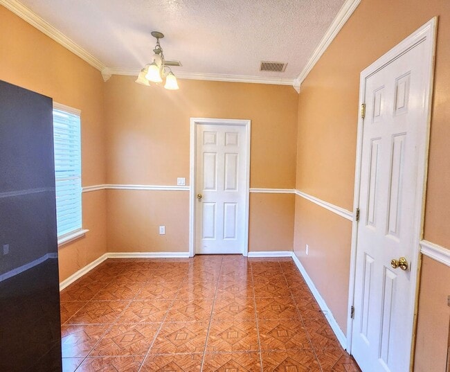 Building Photo - Spacious 4BR w/ Fenced Yard + Covered Lanai + 2 Car Garage  in Orange Park!