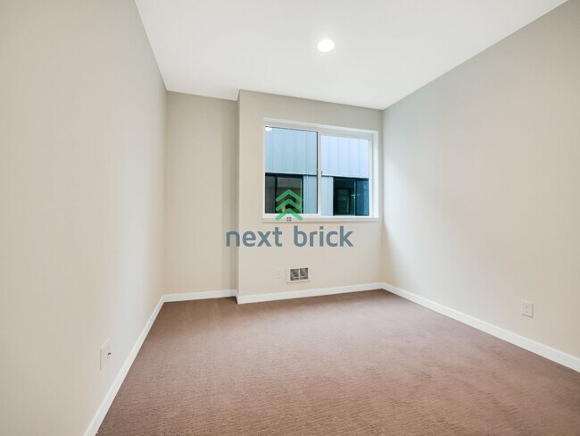 Building Photo - Stunning 2023-Built Crown Hill Townhome | 3 Bed | 2 Bath | Modern Finishes & Prime Seattle Location